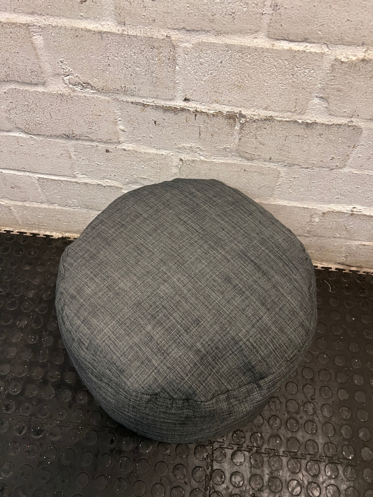 Textured Grey Round Puffed Ottoman — Clean Condition – back view