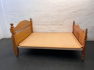 Honey Oak Queen Bed Frame with Spindle Detail — Damaged Mattress; Frame in Good Condition – back view