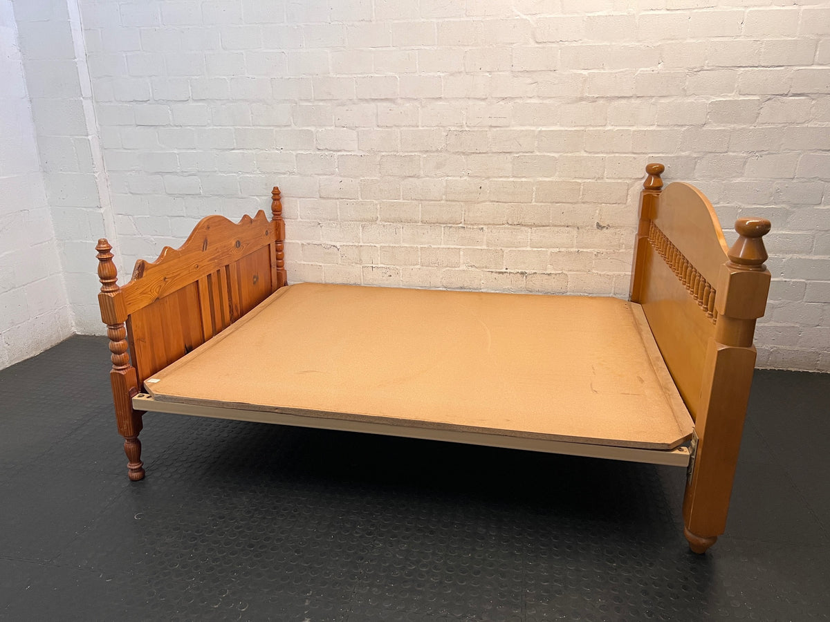 Honey Oak Queen Bed Frame with Spindle Detail — Damaged Mattress; Frame in Good Condition – side view