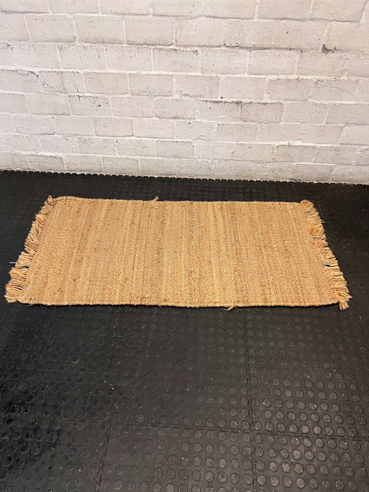 Natural Woven Coir Rug with Fringed Edges — Fair Used Condition – back view