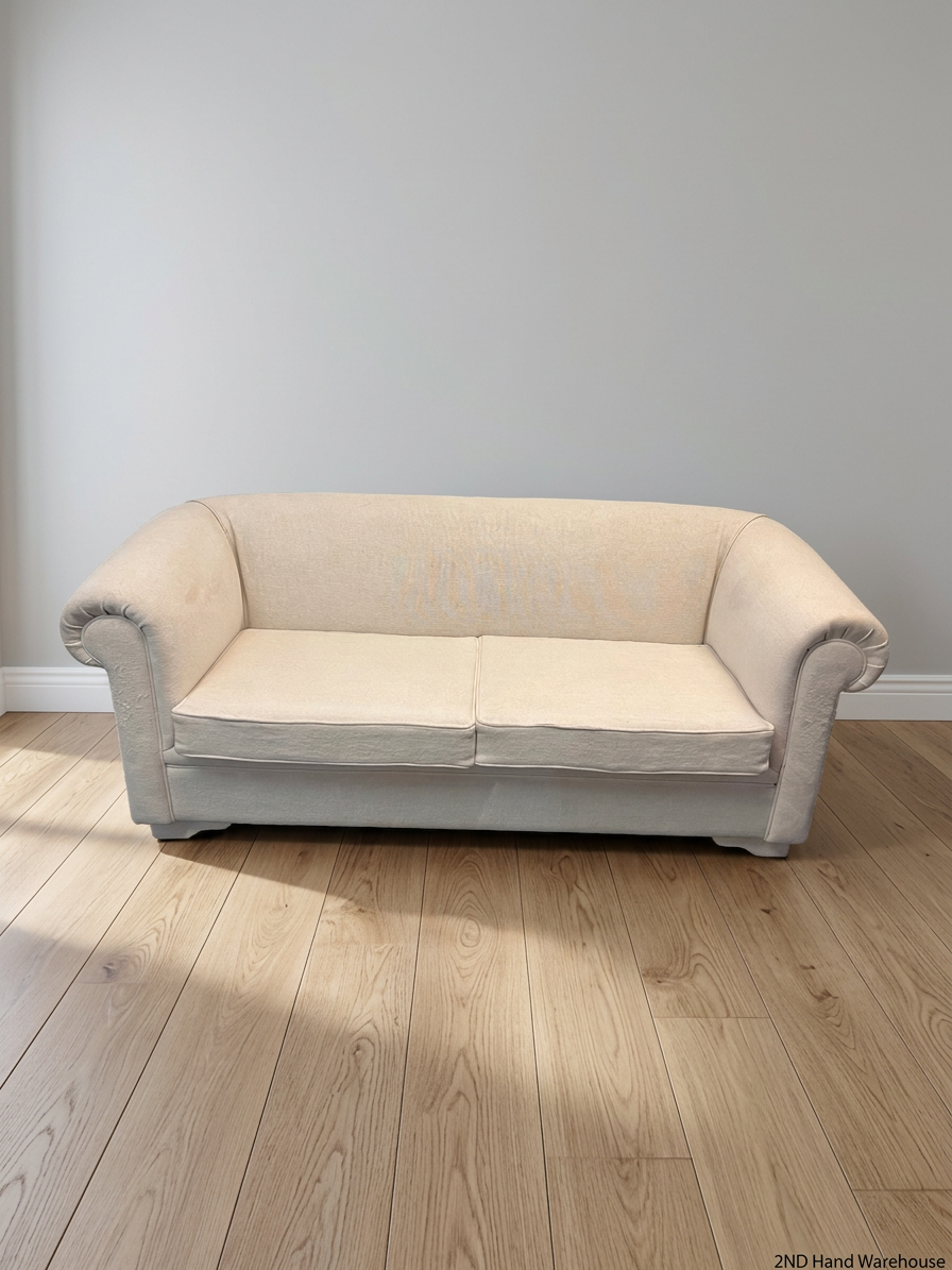 Cream Upholstered 2 Seater Couch with Rolled Arms — Slight Cat Claw Marks on Upholstery – styled product image