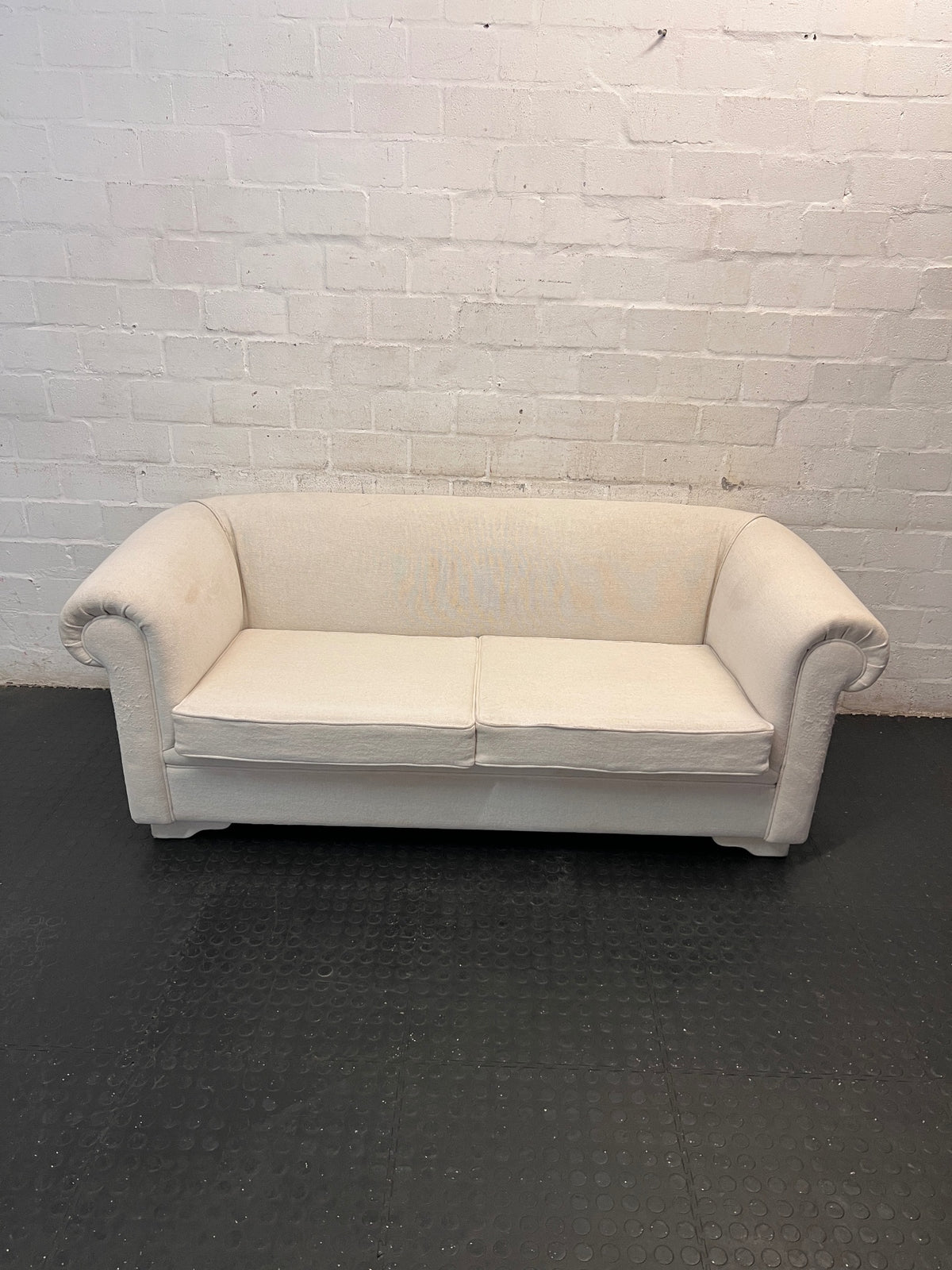 Cream Upholstered 2 Seater Couch with Rolled Arms — Slight Cat Claw Marks on Upholstery – top view