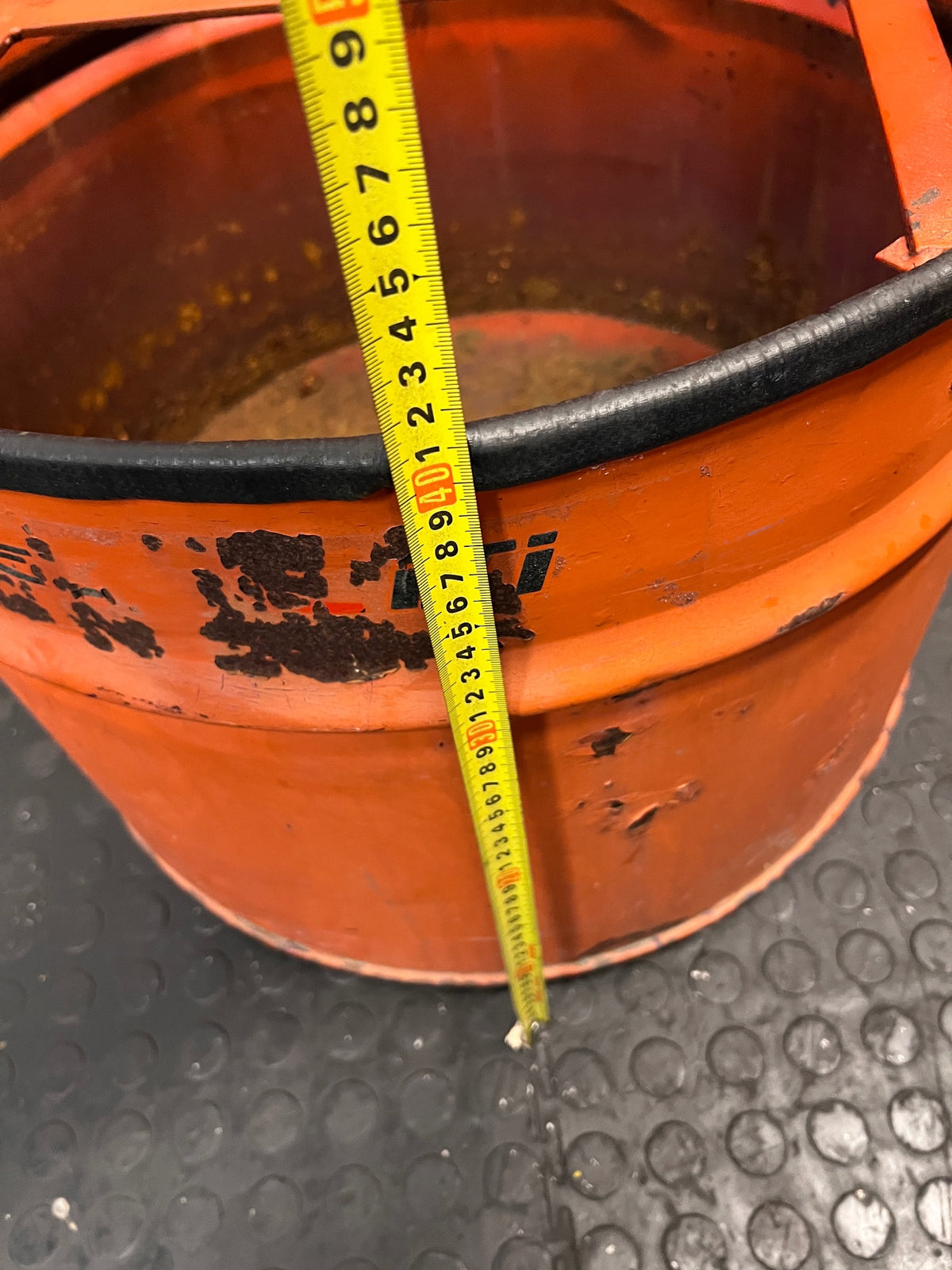 Repurposed Orange Metal Oil Drum Chair – depth measurement
