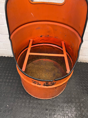 Repurposed Orange Metal Oil Drum Chair – side view