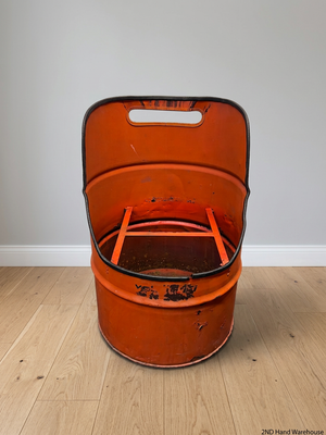 Repurposed Orange Metal Oil Drum Chair – styled product image