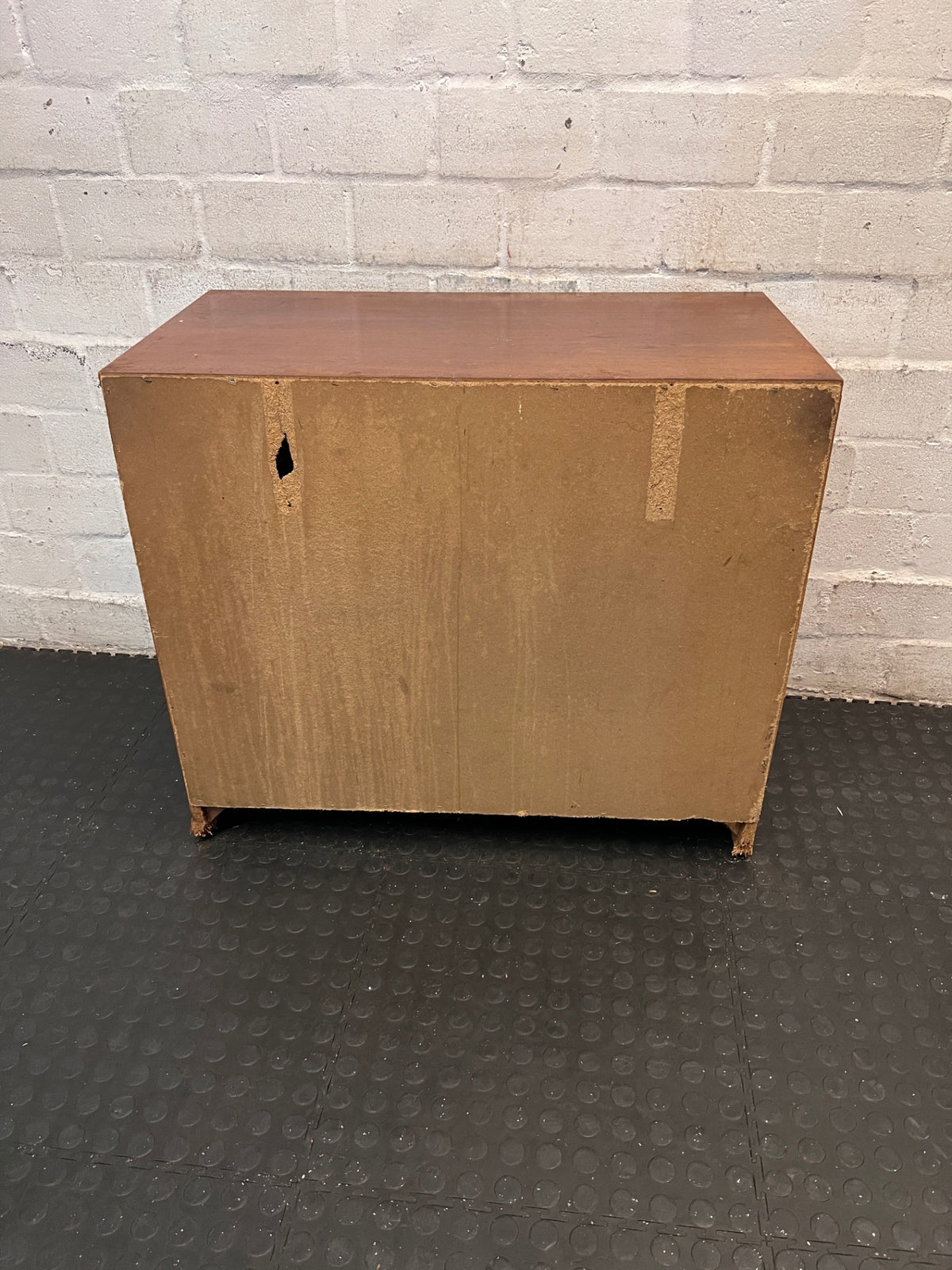 Four-Drawer Wooden Chest with Curved Metal Handles — Damaged with Significant Veneer Loss – back view