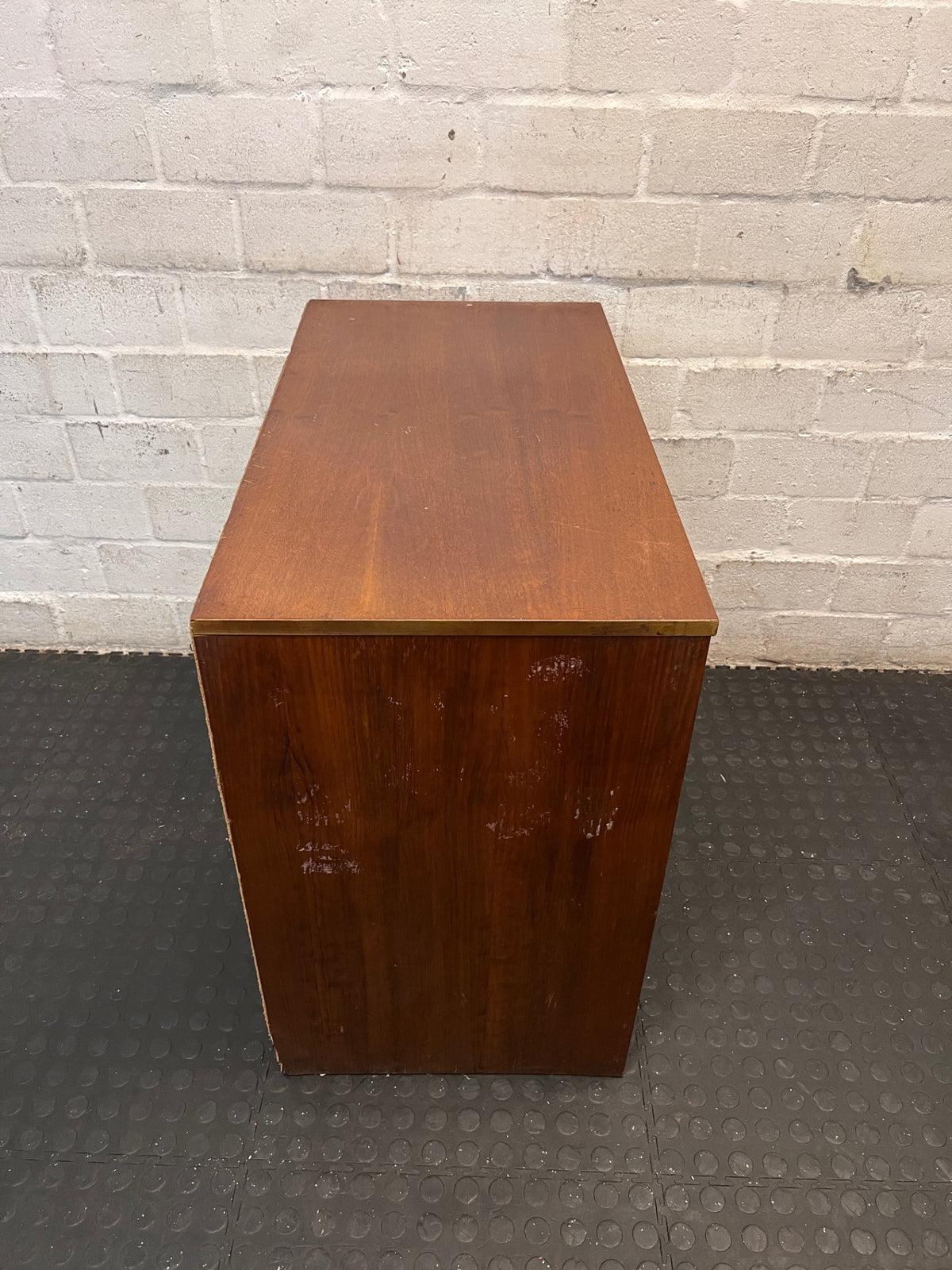 Four-Drawer Wooden Chest with Curved Metal Handles — Damaged with Significant Veneer Loss – top view