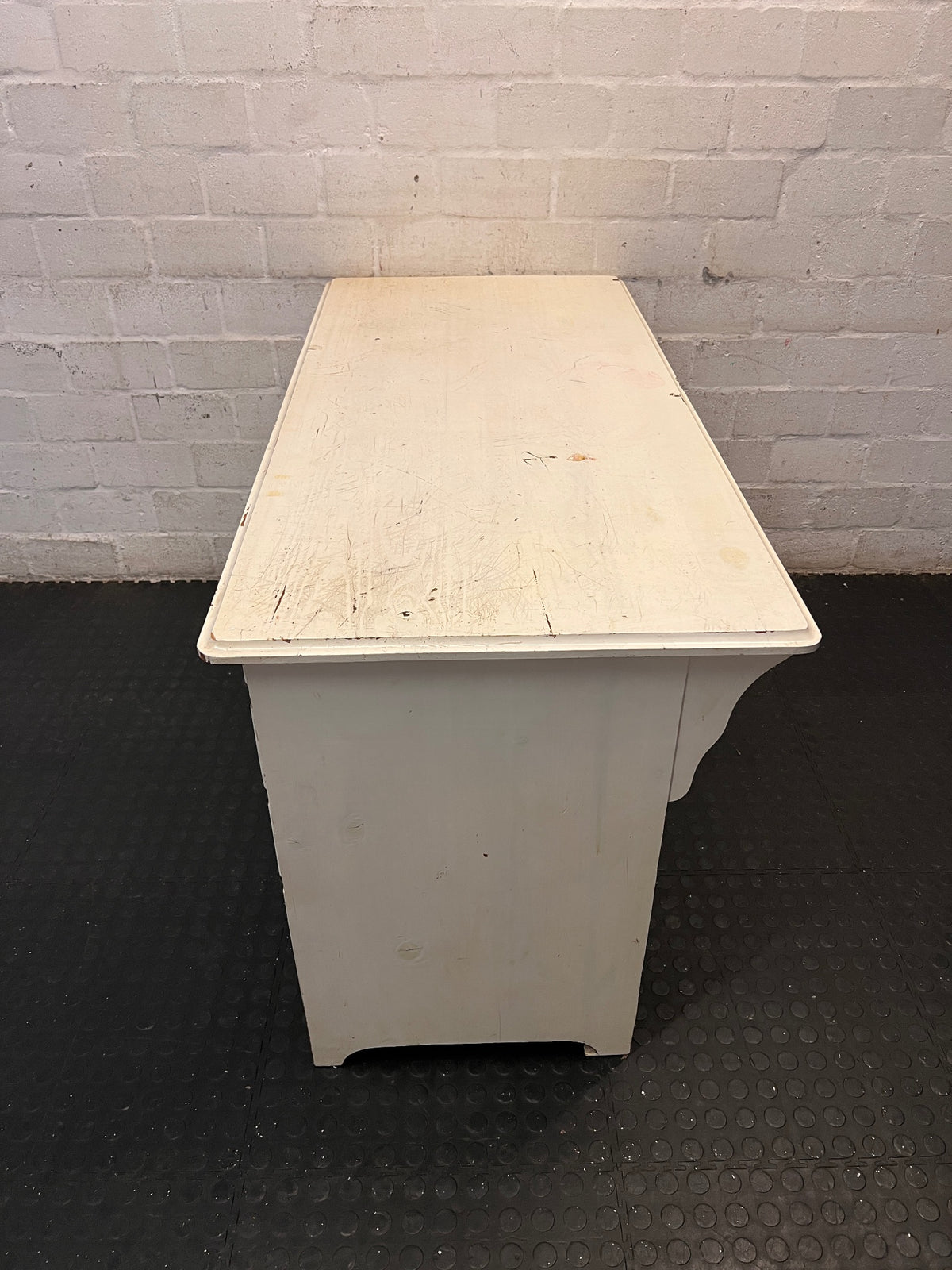 White Wooden Twin-Pedestal Office Desk — Well Used with Missing Hardware – condition detail