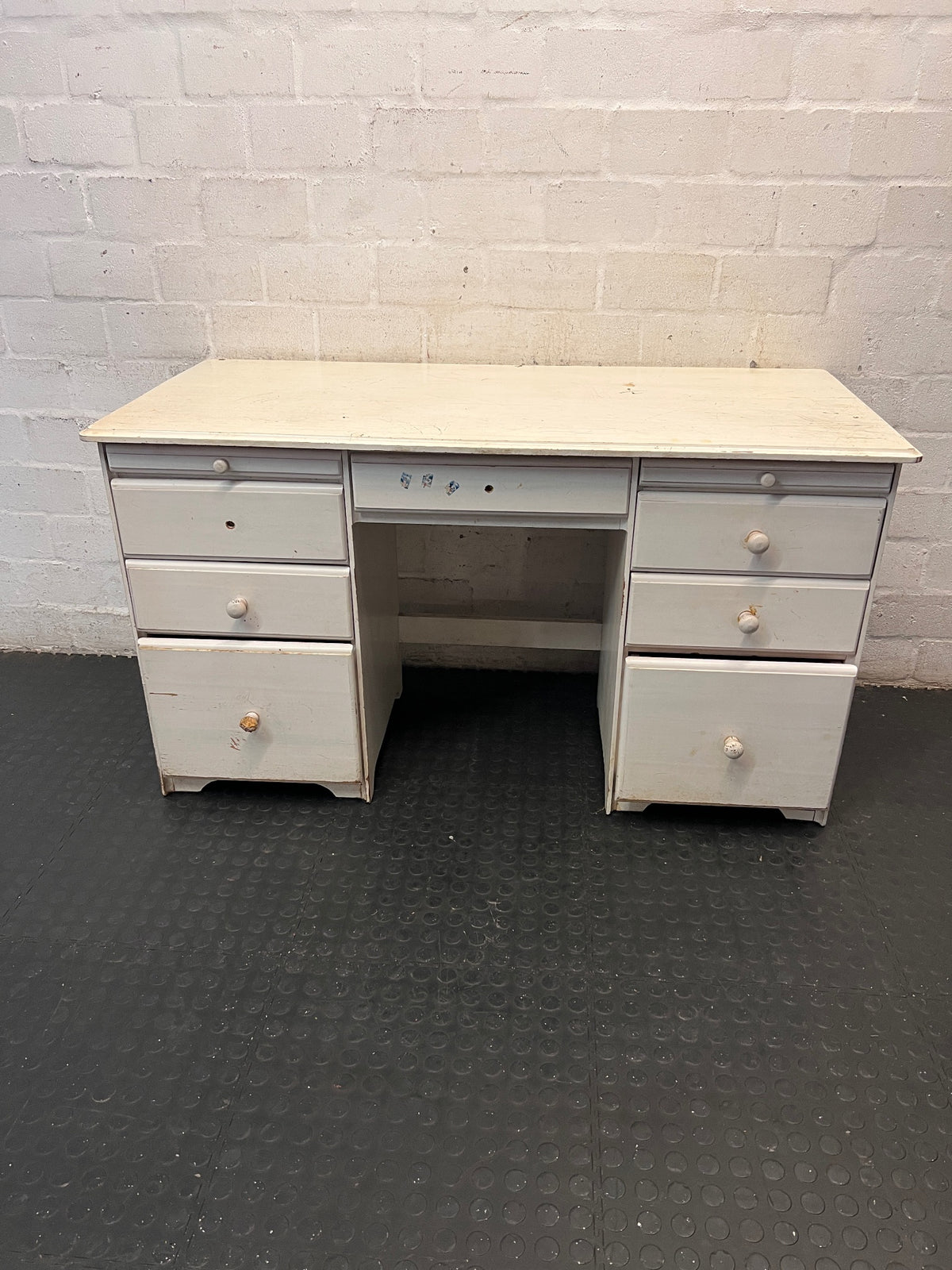 White Wooden Twin-Pedestal Office Desk — Well Used with Missing Hardware – main front view