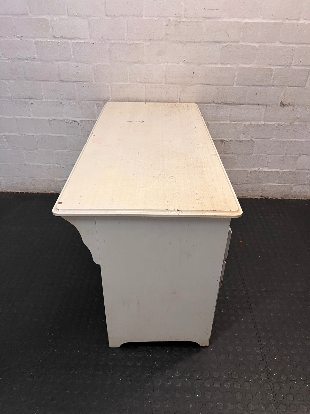 White Wooden Twin-Pedestal Office Desk — Well Used with Missing Hardware – top view