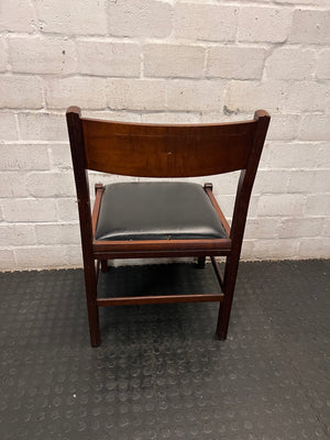 Vintage-Style Wooden Dining Chair with Black Padded Seat — Well Used Condition – back view
