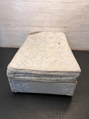 Single Upholstered Base Set with Patterned Mattress — Well Used with Significant Staining – back view