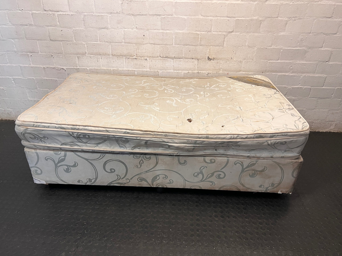 Single Upholstered Base Set with Patterned Mattress — Well Used with Significant Staining – top view