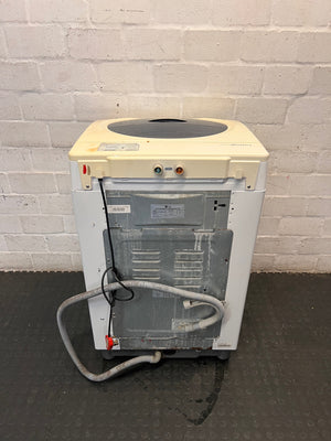 LG TurboDrum Top Loader Washing Machine — Working with Visible Rust and Discolouration – back view