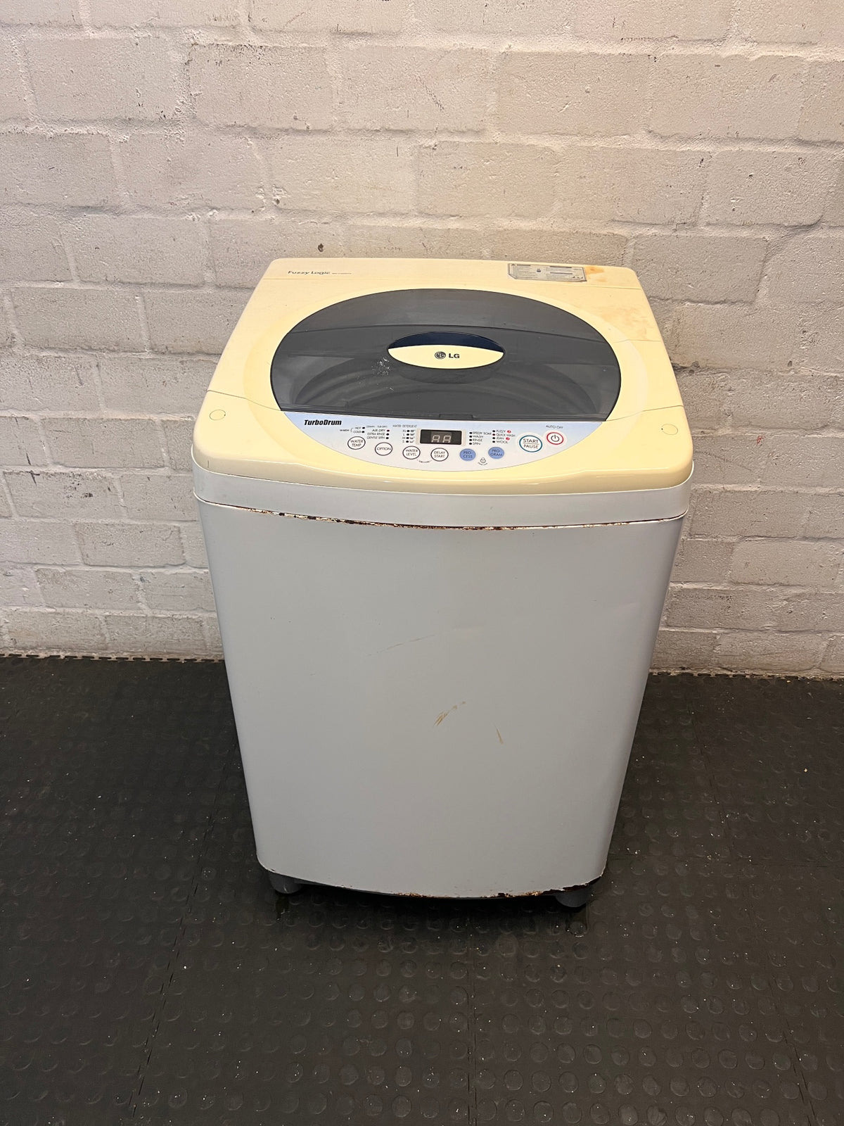 LG TurboDrum Top Loader Washing Machine — Working with Visible Rust and Discolouration – main front view
