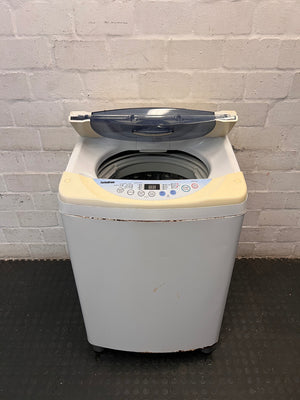 LG TurboDrum Top Loader Washing Machine — Working with Visible Rust and Discolouration – side view