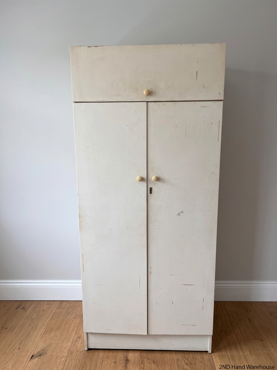 White Double Door Wardrobe with Top Cupboard — Well Used Condition with Surface Marks – styled product image