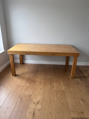Rustic Oak-Tone Wooden Dining and Work Table — Unfinished Wood with Paint Splatter and Water Rings – styled product image