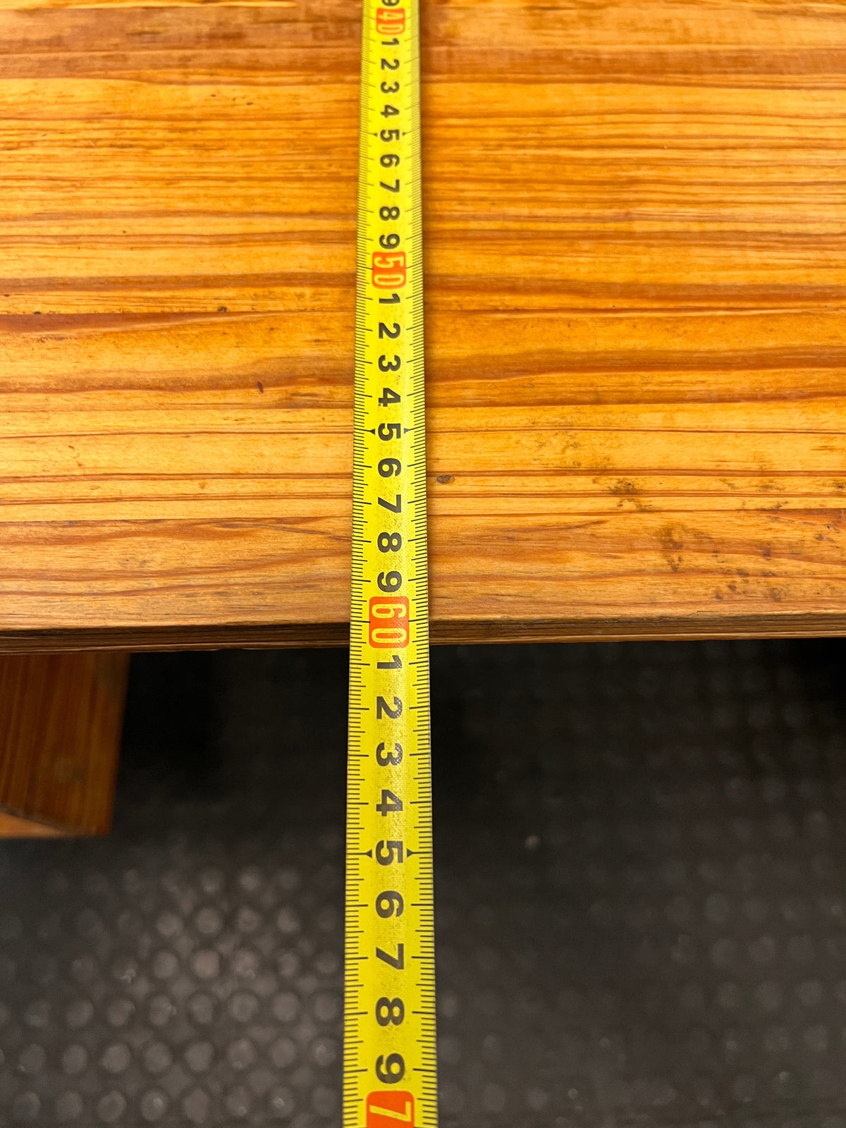 Wooden Office Desk with Open Shelving and Tapered Legs — Adhered Residue and Sticky Wood Surface – depth measurement