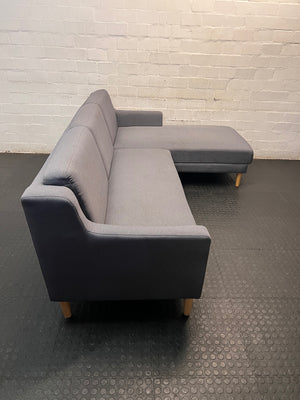 Grey L-Shaped Sectional Couch with Tapered Wood Legs — Cut at Base and Missing Attachment Bracket – side view