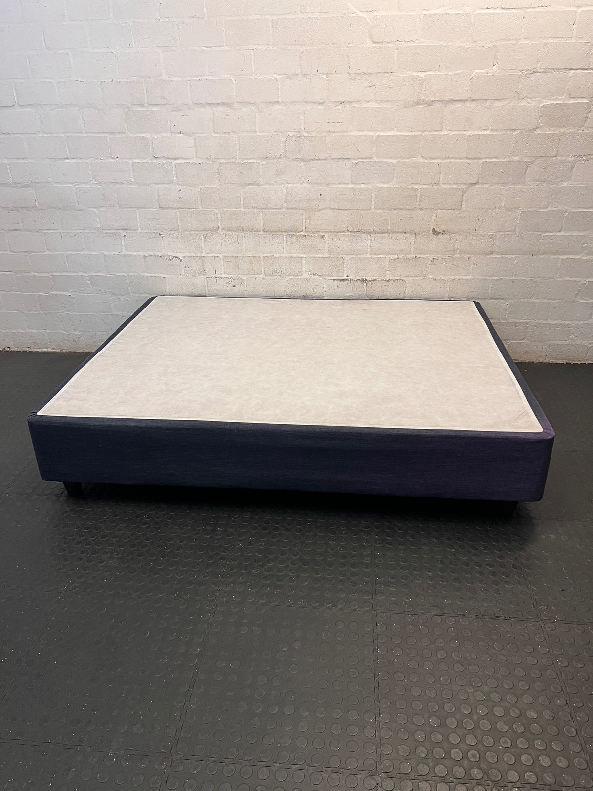 Upholstered Queen Bed Base in Grey — Good Working Order – side view
