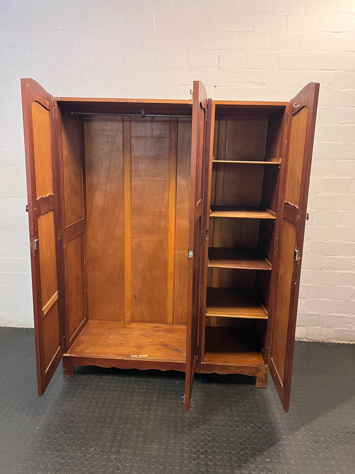 Three-Door Arched Wooden Wardrobe with Chevron Detail – side view