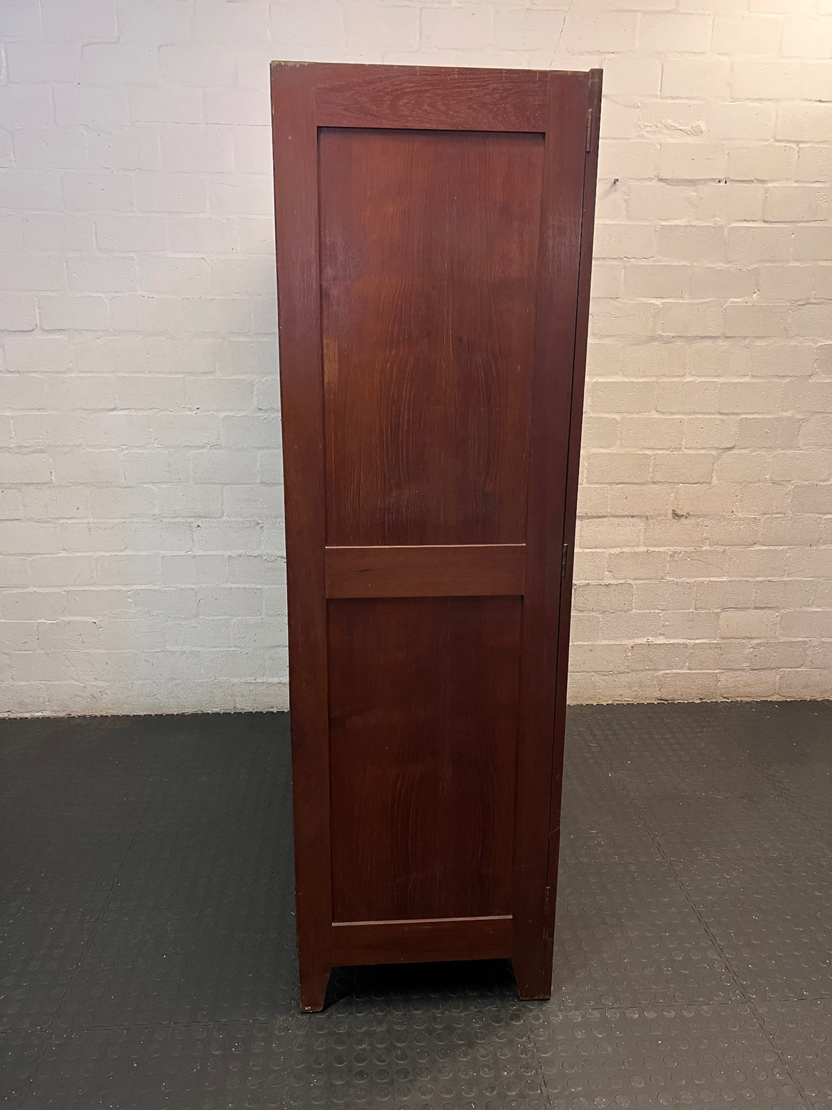 Three-Door Arched Wooden Wardrobe with Chevron Detail – top view