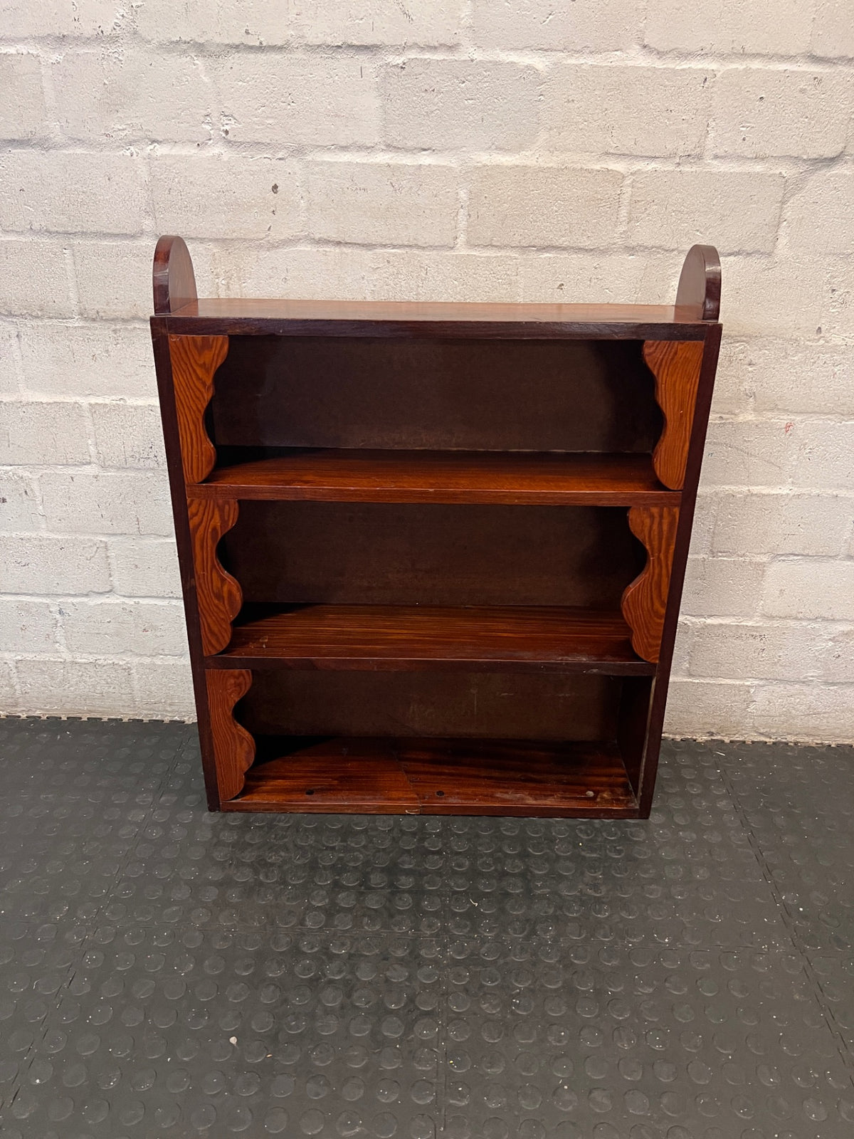 Wooden Bookshelf with Scalloped Detail – top view