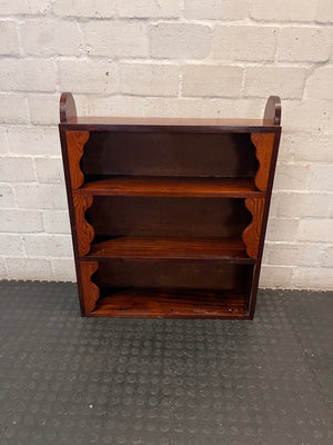 Wooden Bookshelf with Scalloped Detail – top view