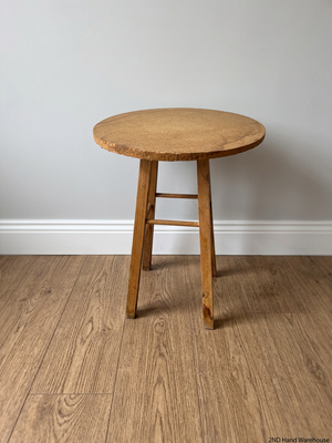 Round Wooden Side Table with Cross-Stretcher Base – styled product image