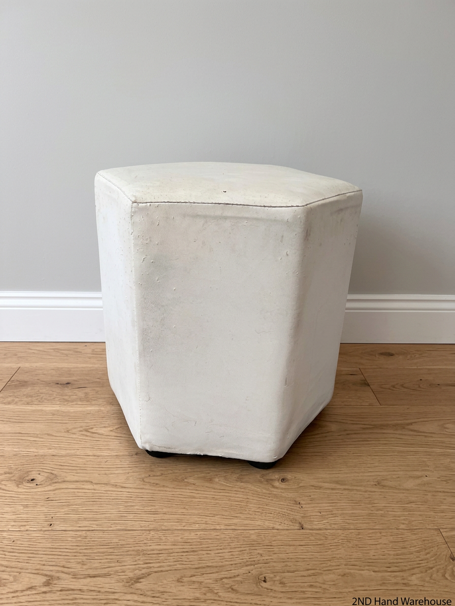 White Hexagonal Upholstered Ottoman — Aged Upholstery with Visible Wear – styled product image