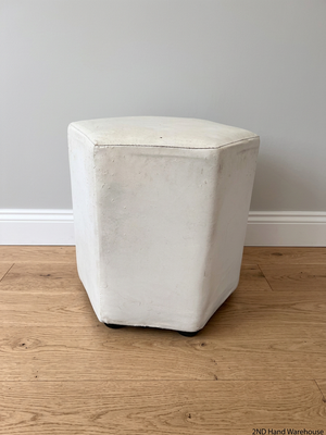 White Hexagonal Upholstered Ottoman — Aged Upholstery with Visible Wear – styled product image