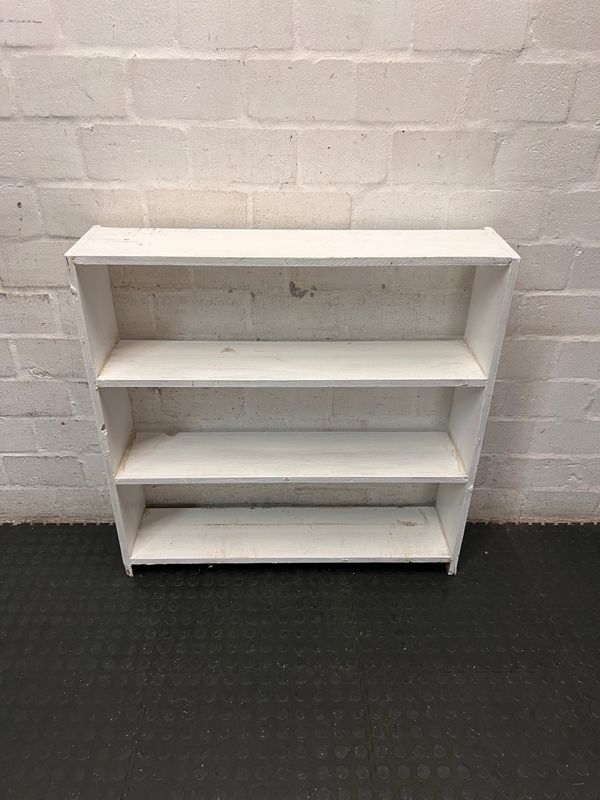 White Wooden Low Bookshelf — Well Used with Visible Surface Wear – condition detail
