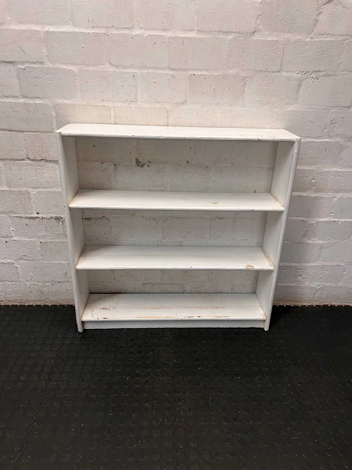 White Wooden Low Bookshelf — Well Used with Visible Surface Wear – main front view