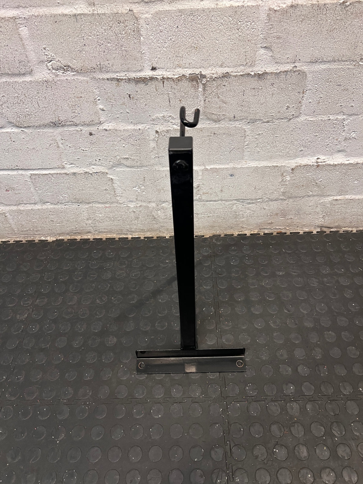 Black Wall-Mounted Punch Bag Bracket — Good Working Order – main front view