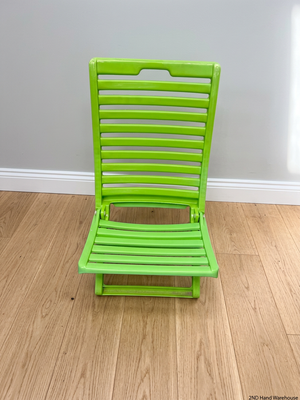 Lime Green Plastic Folding Outdoor Chair — Faded Finish on Chairs – styled product image