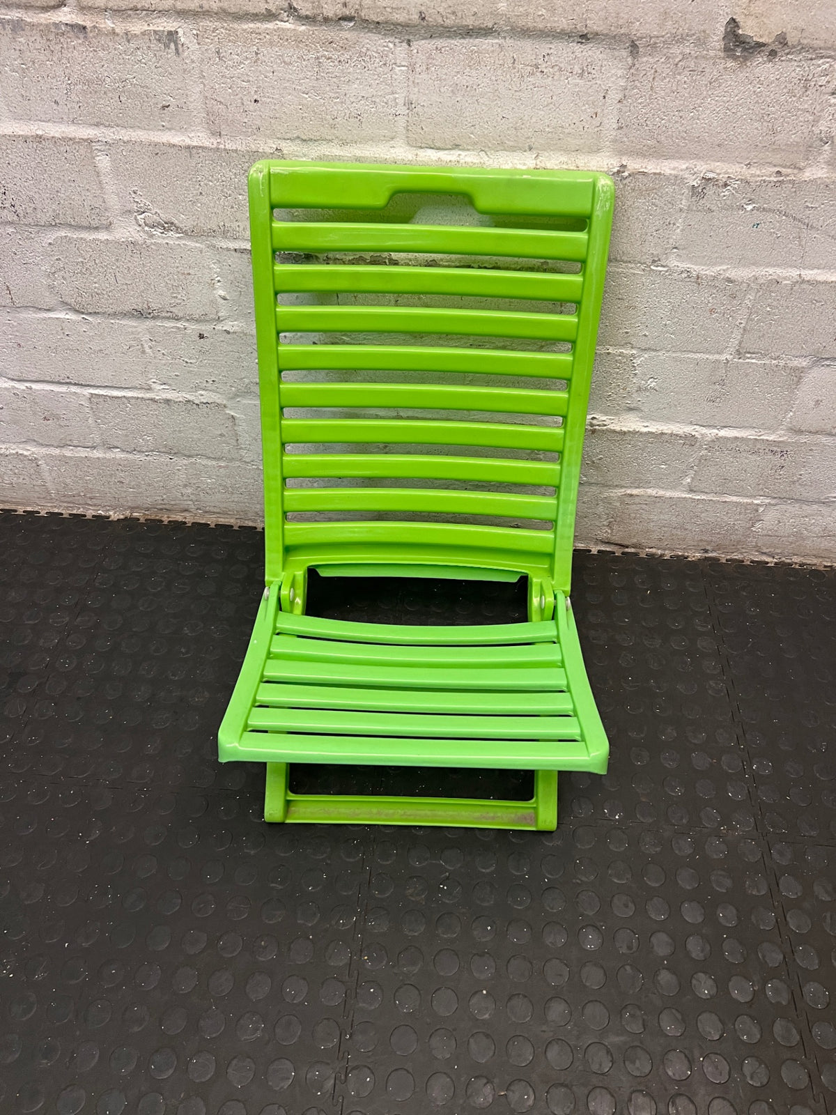 Lime Green Plastic Folding Outdoor Chair — Faded Finish on Chairs – top view