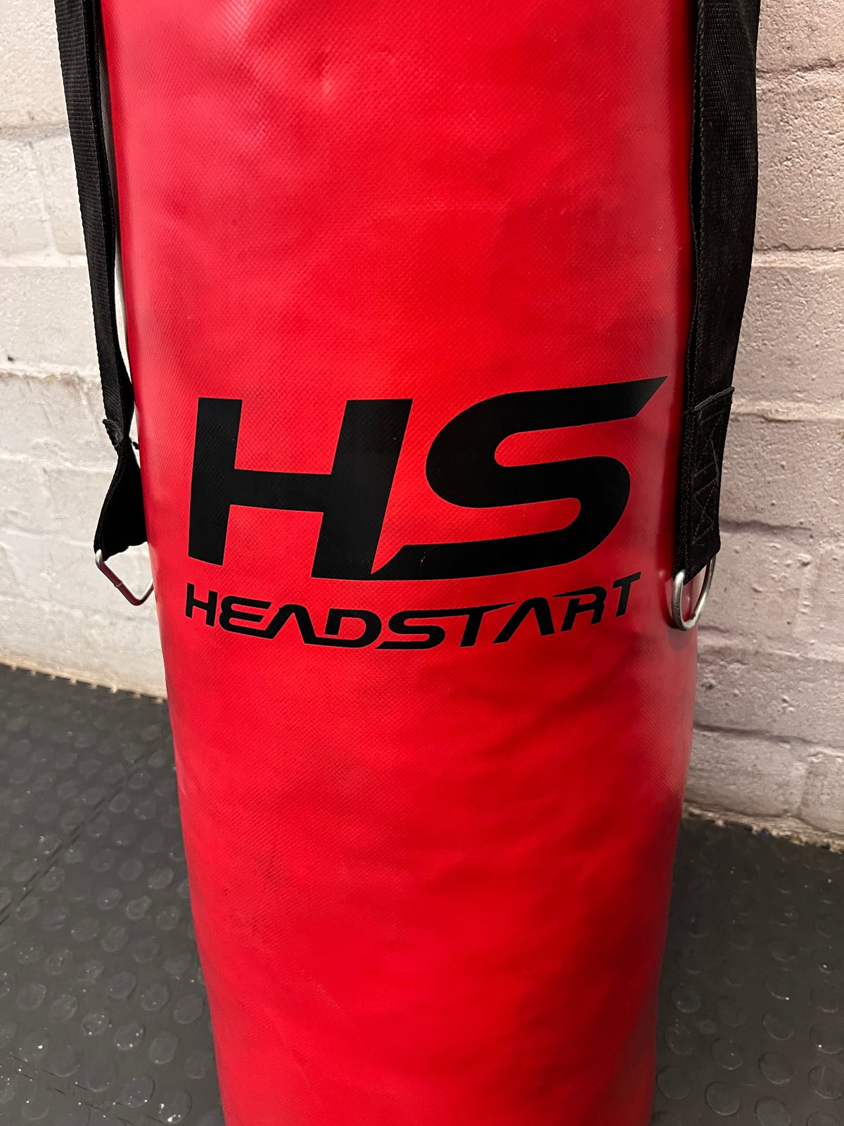 Red Headstart Heavy Boxing Bag with Hanging Straps — Good Working Order – side view