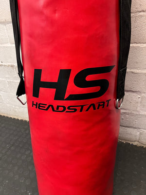 Red Headstart Heavy Boxing Bag with Hanging Straps — Good Working Order – side view