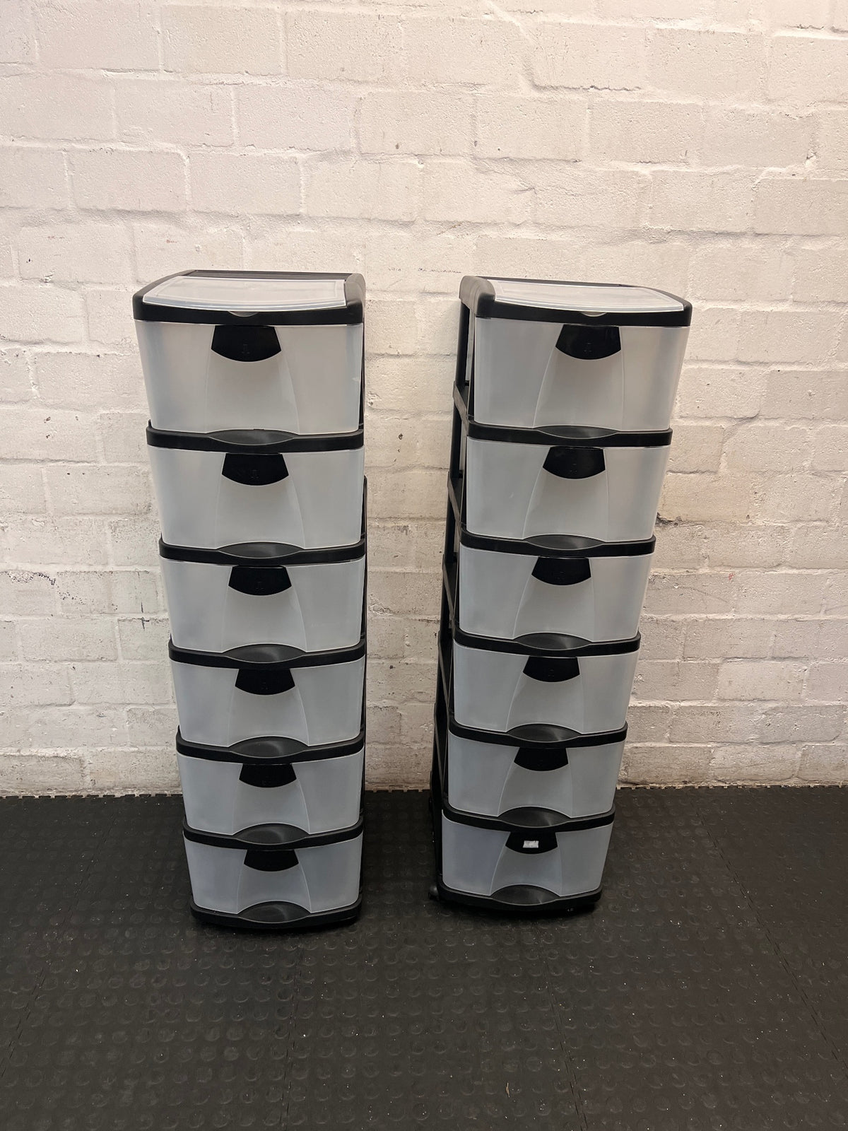 6-Tier Black and Translucent Plastic Storage Tower — Used; Fair Condition – condition detail