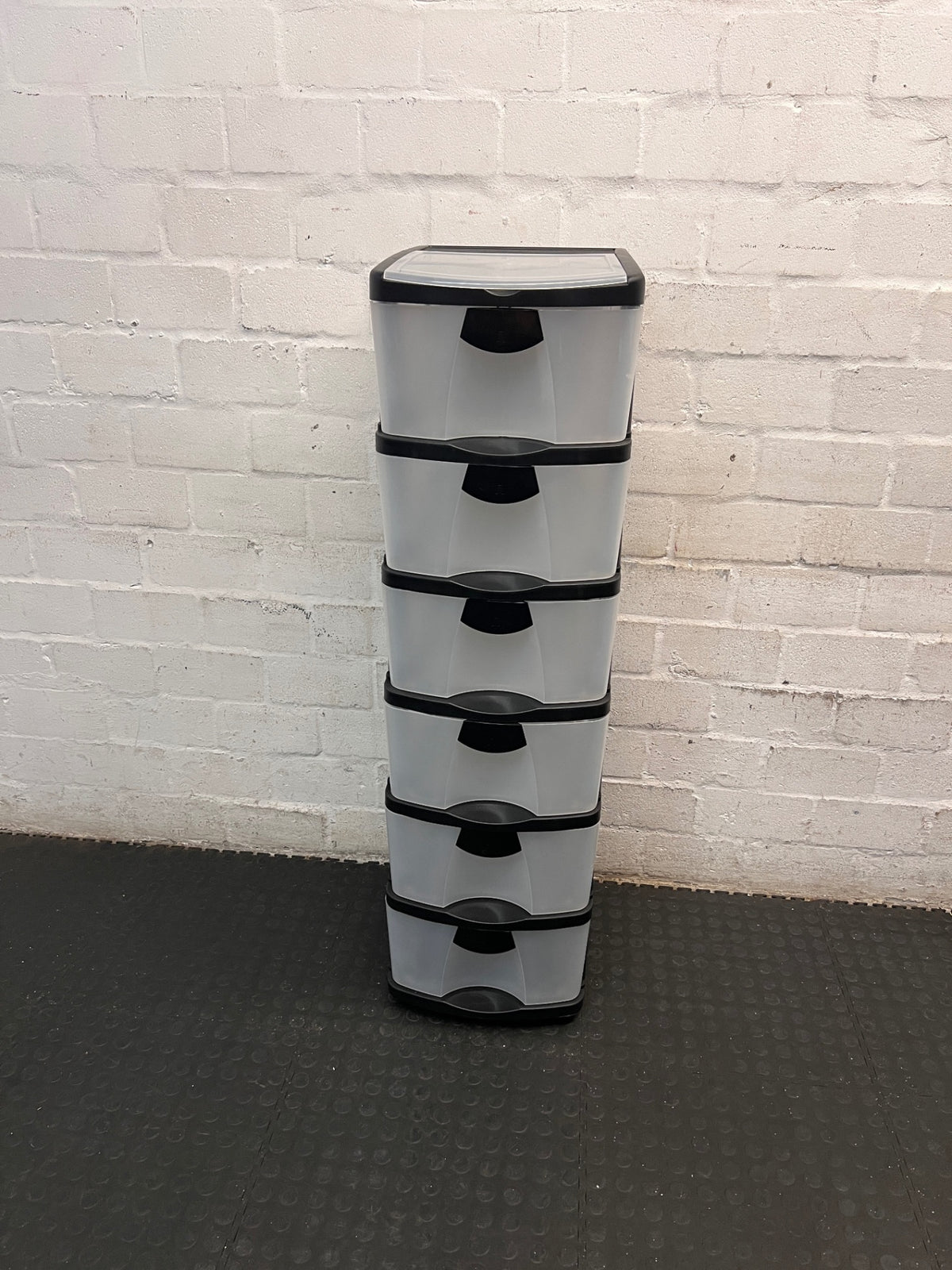 6-Tier Black and Translucent Plastic Storage Tower — Used; Fair Condition – main front view