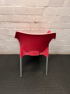 Modern Red Moulded Plastic Chair with Metal Legs — Faded Red Chairs in Fair Condition – back view