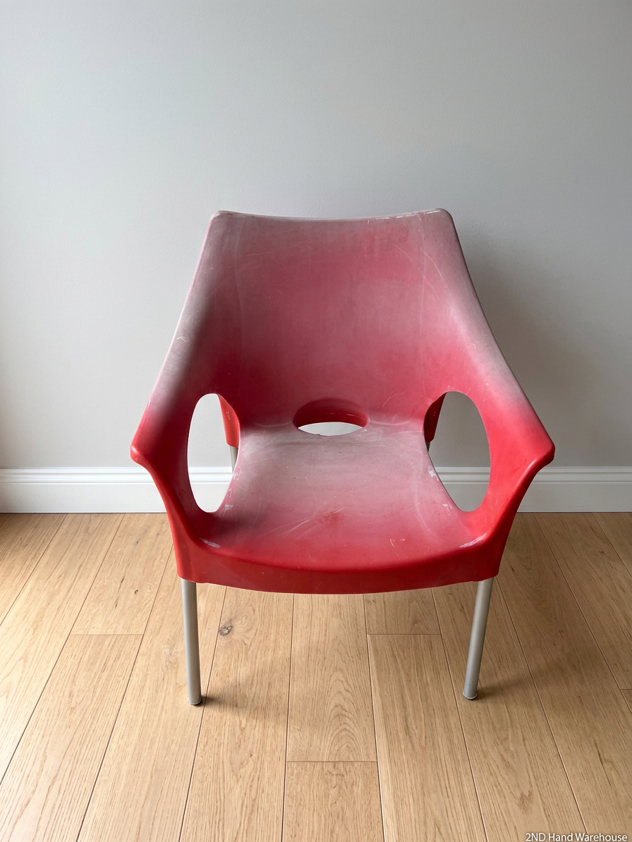 Modern Red Moulded Plastic Chair with Metal Legs — Faded Red Chairs in Fair Condition – styled product image