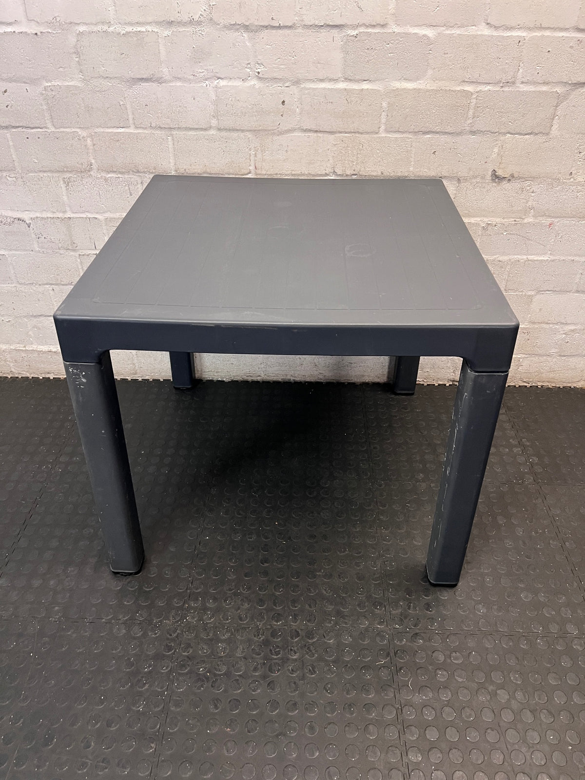 Square Charcoal Grey Multipurpose Table — Visible Surface Marks and Scuffs – back view