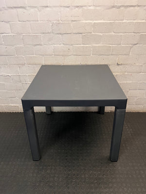 Square Charcoal Grey Multipurpose Table — Visible Surface Marks and Scuffs – side view