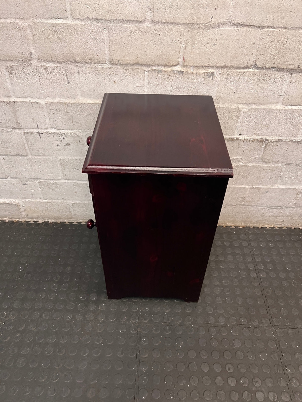 Rich Brown Wooden Bedside Table with Drawer and Cupboard — Fair Condition; Wear and Upkeep Identified – back view