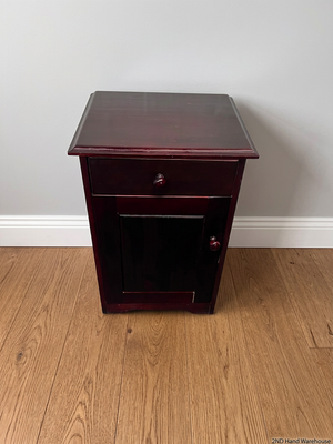 Rich Brown Wooden Bedside Table with Drawer and Cupboard — Fair Condition; Wear and Upkeep Identified – styled product image