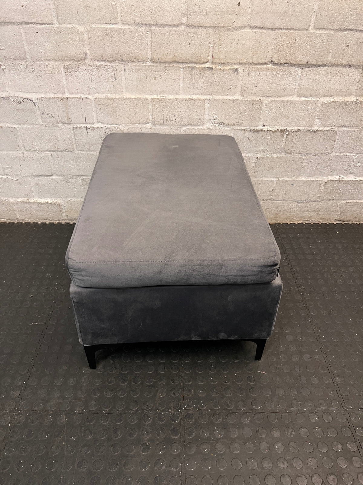 Charcoal Grey Upholstered Ottoman with Black Metal Legs — Good Condition – top view
