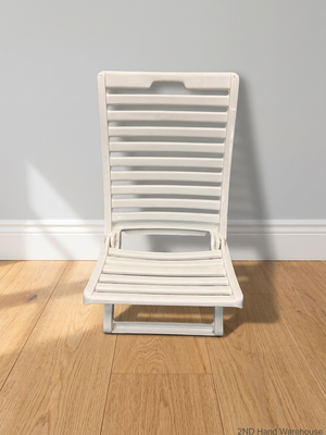 White Slatted Plastic Folding Chair – styled product image