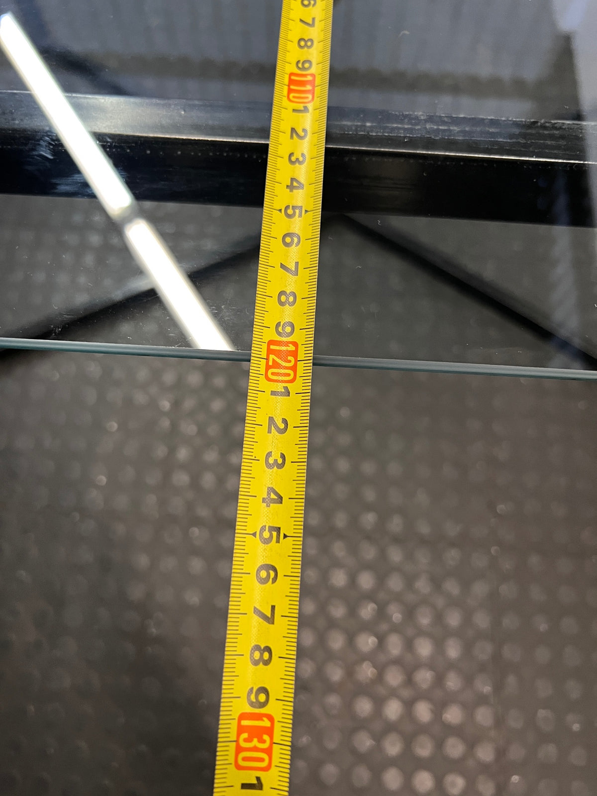 Black Metal and Glass Dining Table with X-Base — Rust Markings on Metal Base – depth measurement